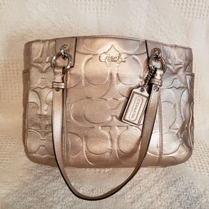 Gold COACH purse.  Signature. Monogram.